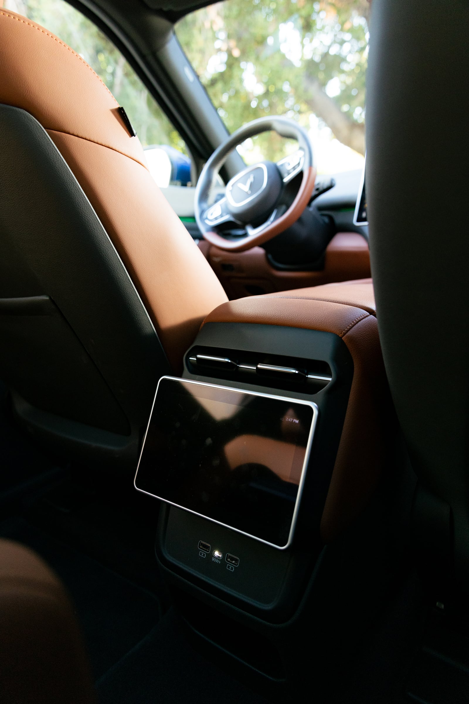 VinFast VF 9 rear seat with the 8-inch rear screen and USB ports on the centre console